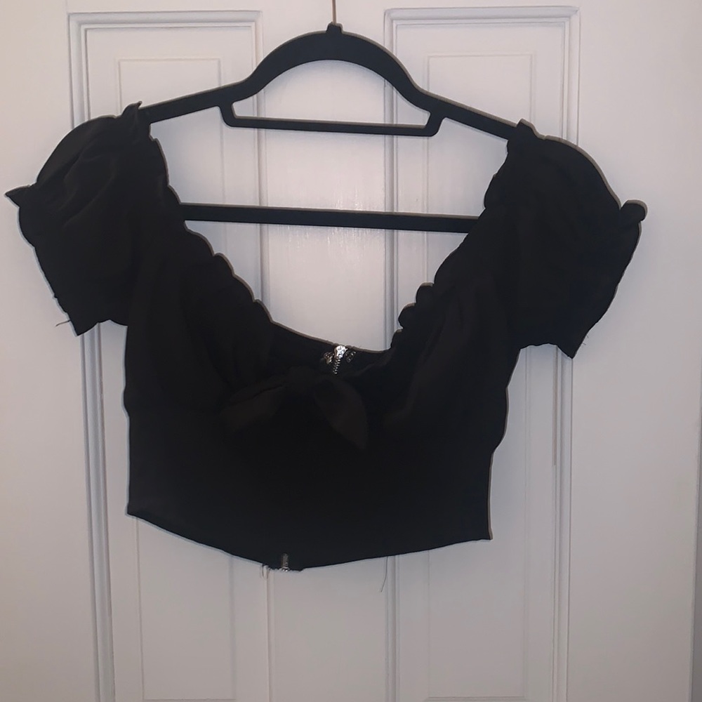 Black ruffle off the shoulder cropped top
